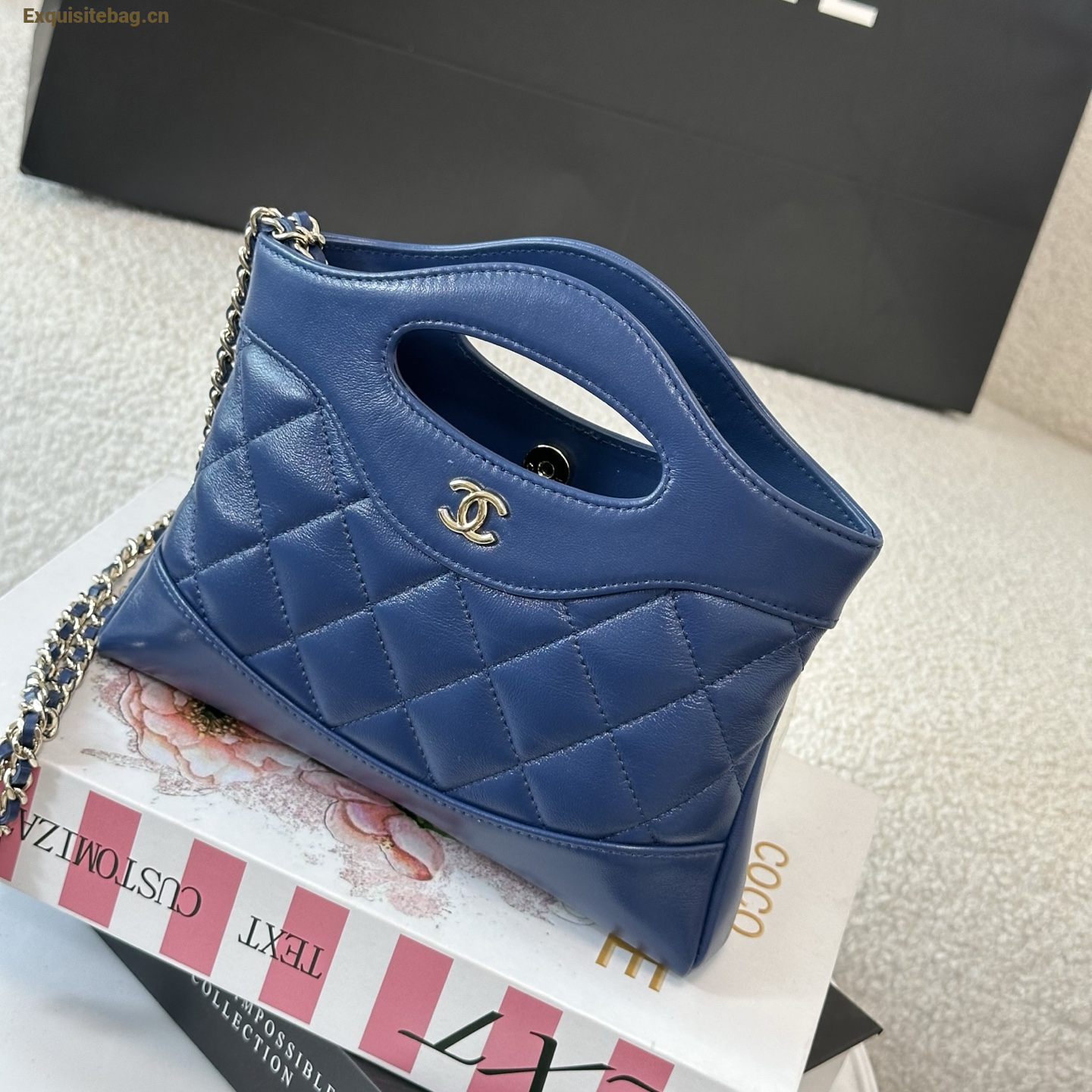 Chanel Blue quilted leather mini tote bag with chain shoulder strap