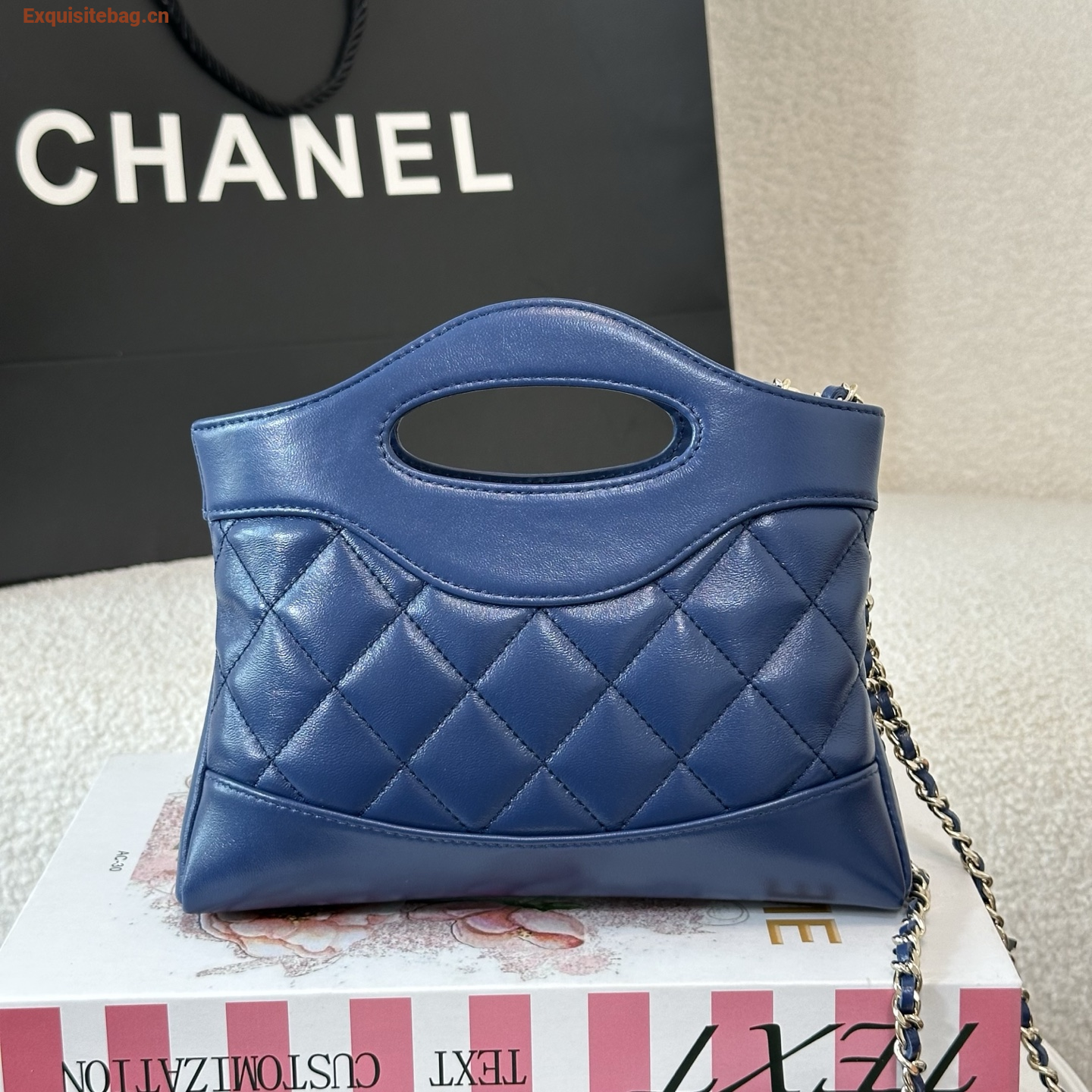 Chanel Blue quilted leather mini tote bag with chain shoulder strap