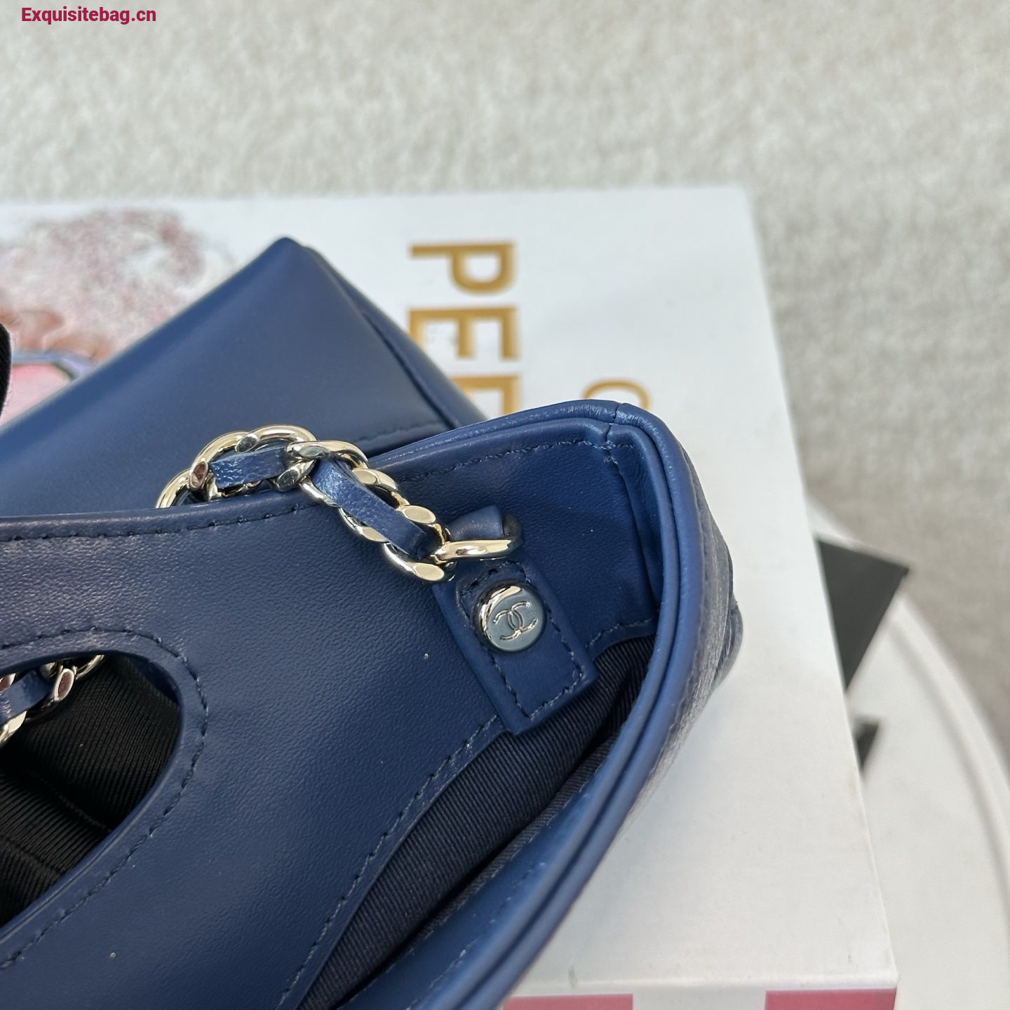 Chanel Blue quilted leather mini tote bag with chain shoulder strap