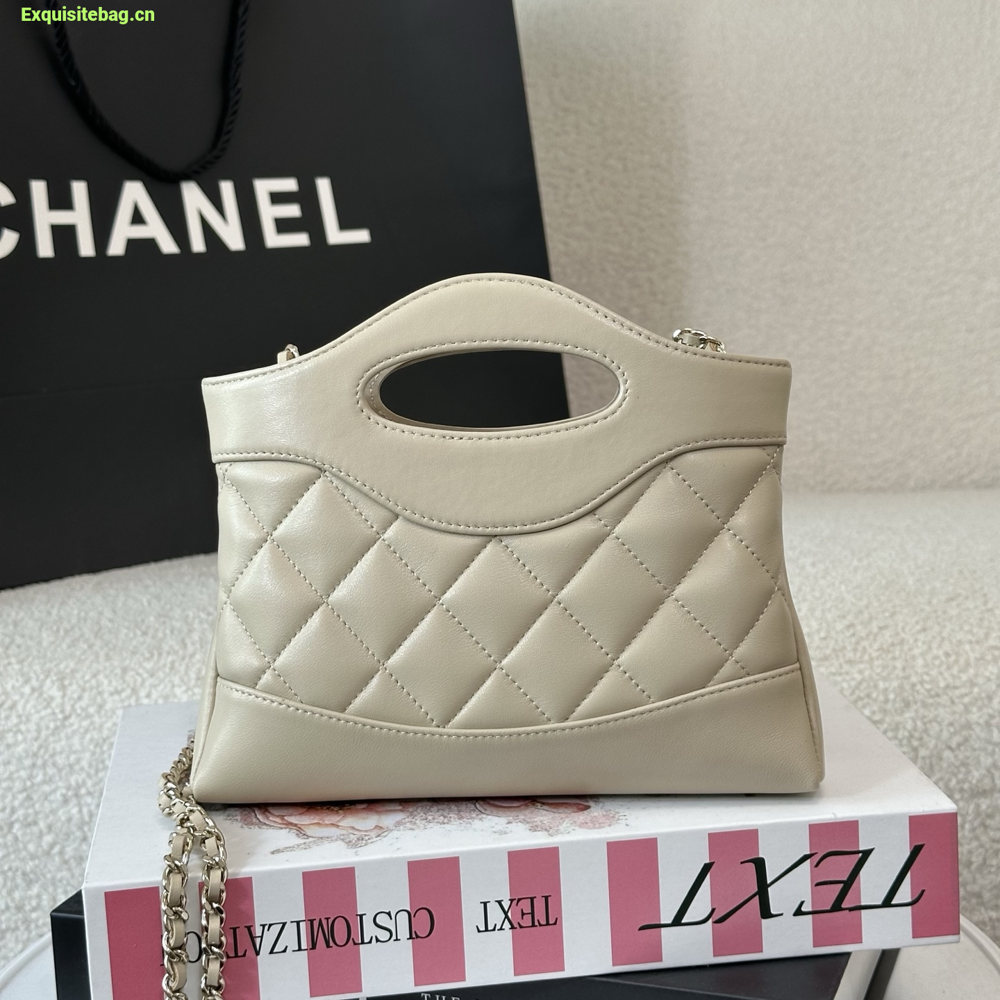 Chanel Beige quilted leather mini tote bag with chain shoulder strap