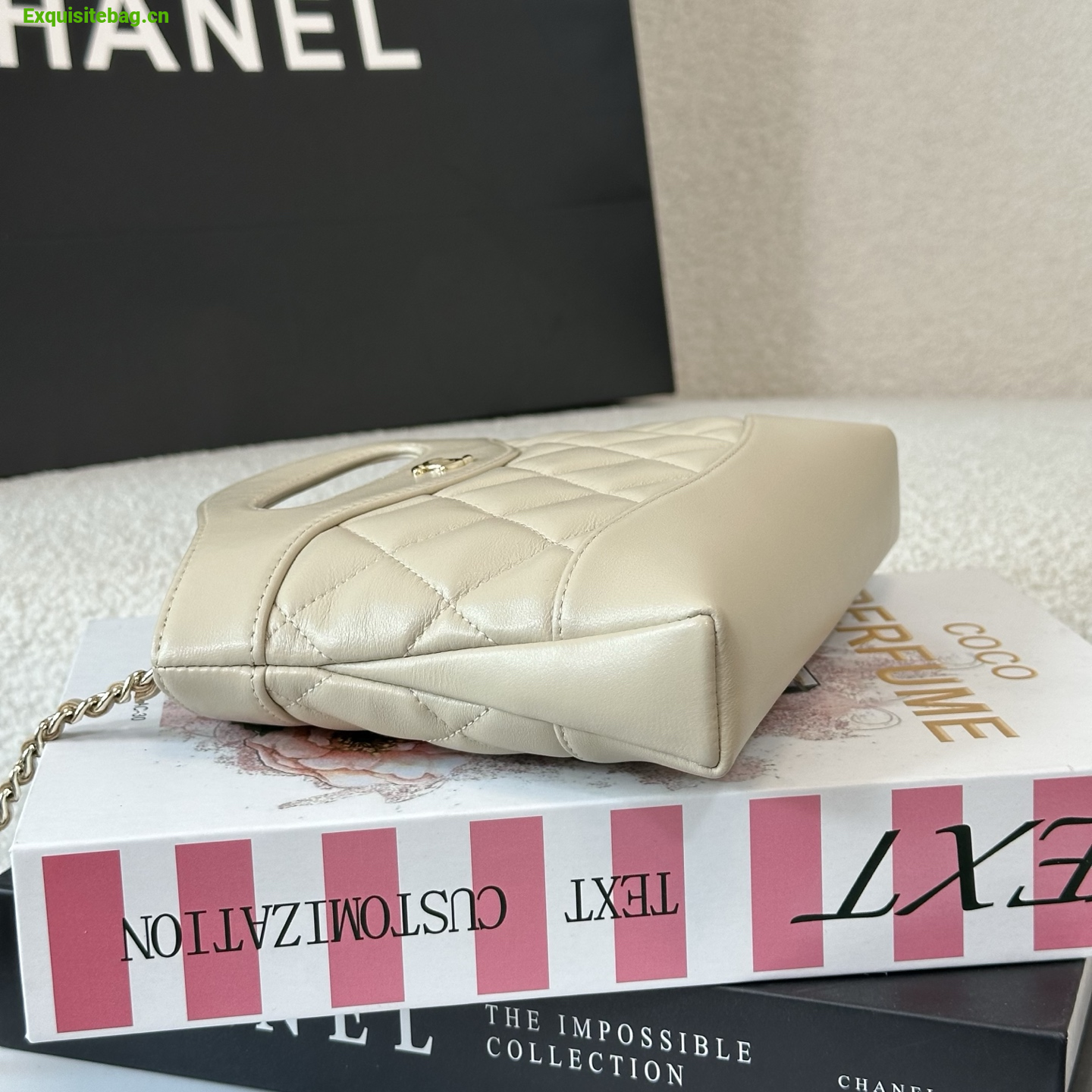 Chanel Beige quilted leather mini tote bag with chain shoulder strap