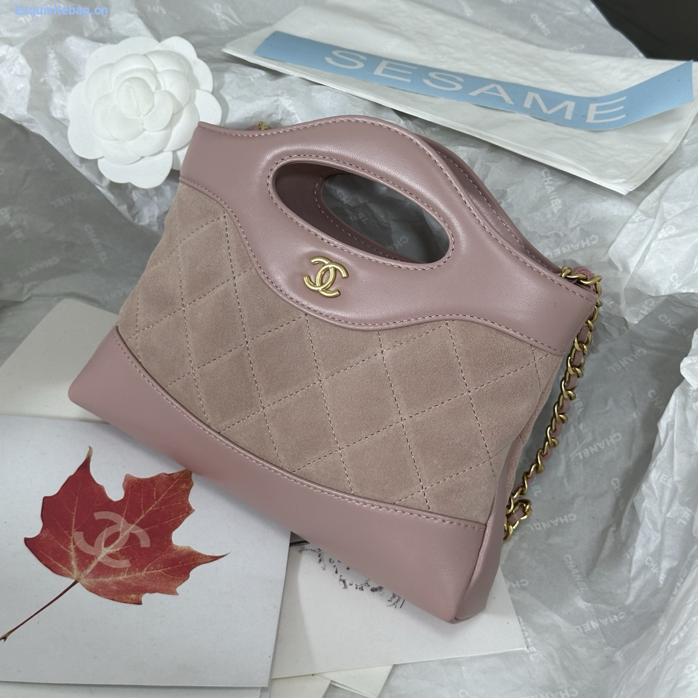 Chanel Light Pink quilted leather mini tote bag with chain shoulder strap