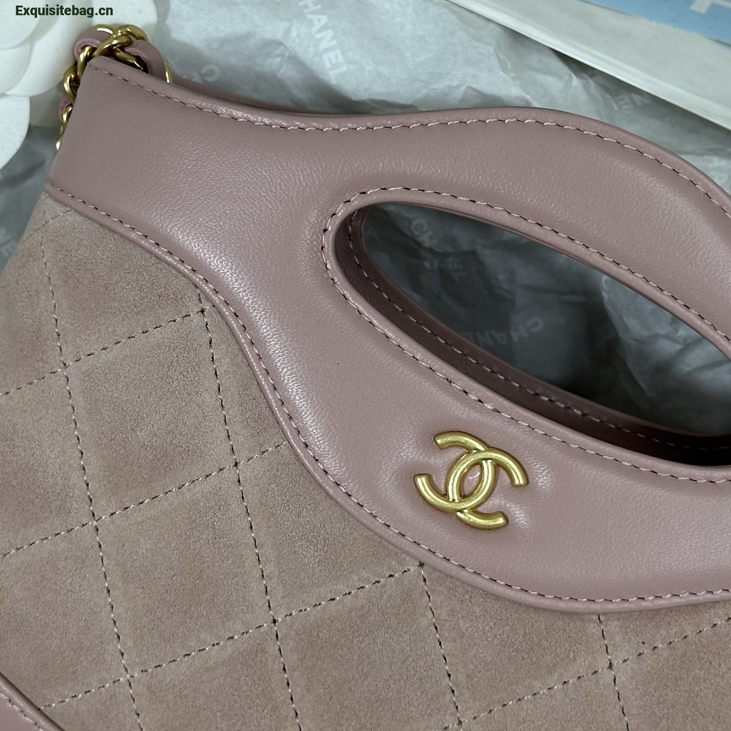 Chanel Light Pink quilted leather mini tote bag with chain shoulder strap