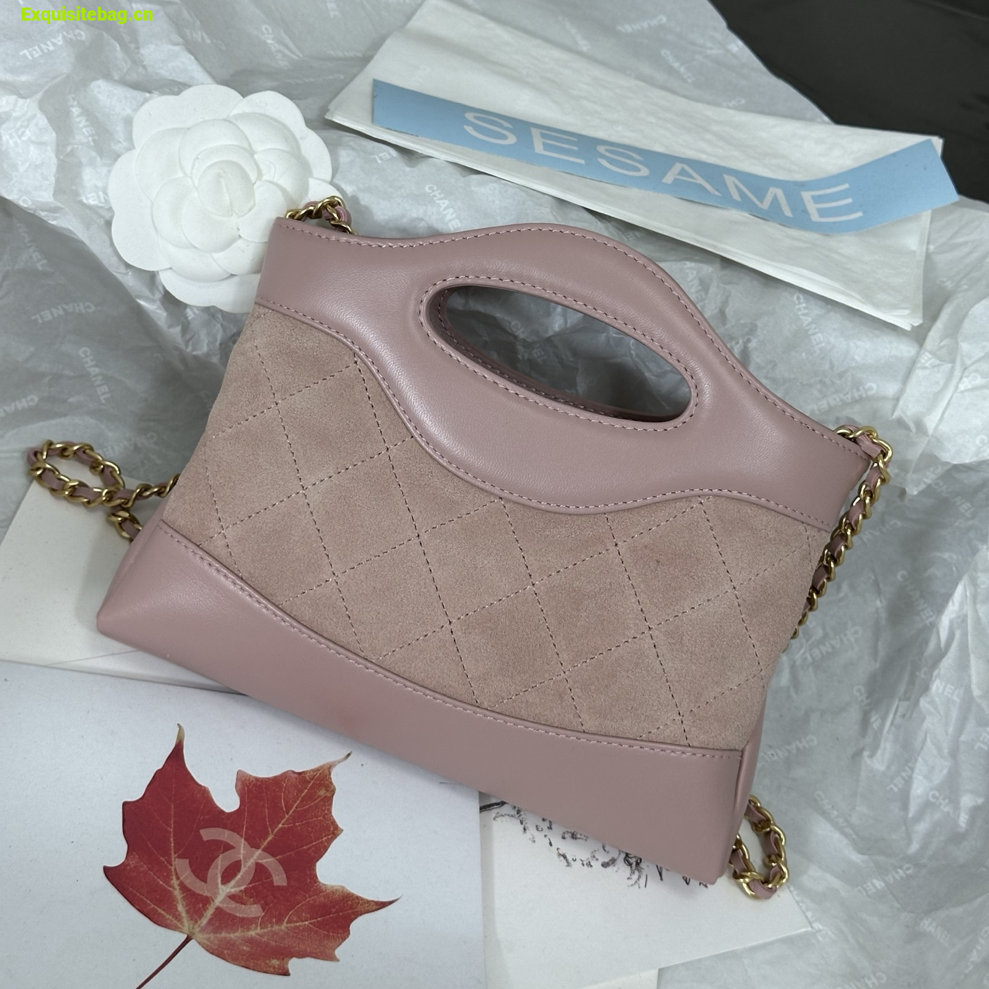 Chanel Light Pink quilted leather mini tote bag with chain shoulder strap