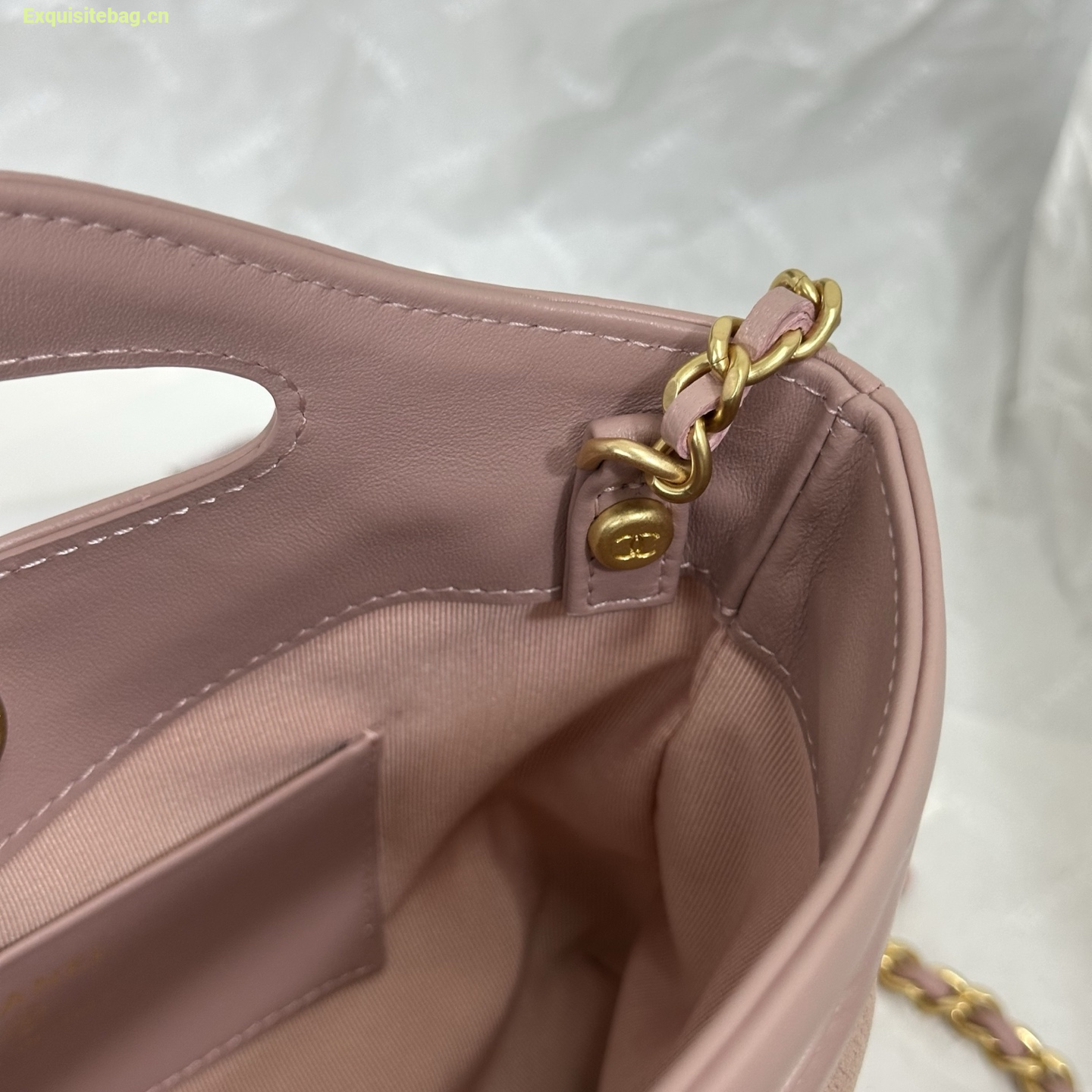 Chanel Light Pink quilted leather mini tote bag with chain shoulder strap