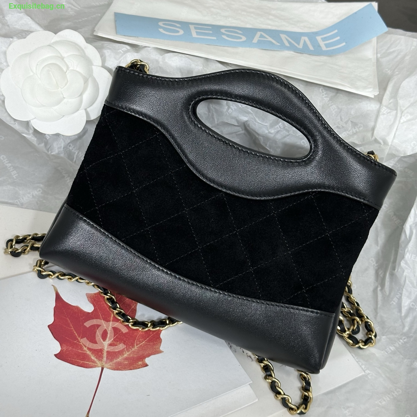 Chanel Black quilted leather mini tote bag with chain shoulder strap
