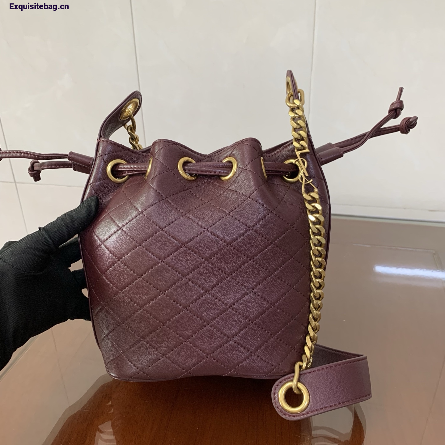 Saint Laurent Cassandra Mini leather bucket bag Burgundy