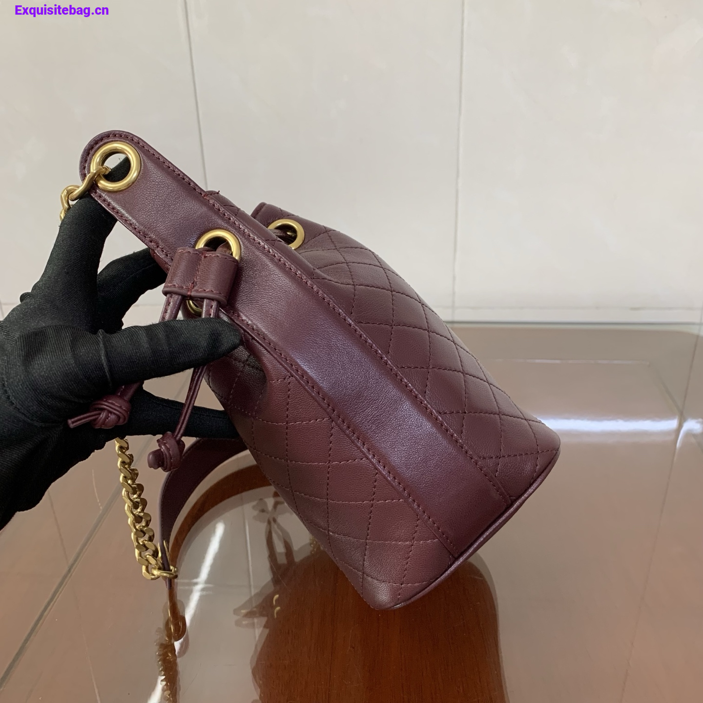 Saint Laurent Cassandra Mini leather bucket bag Burgundy