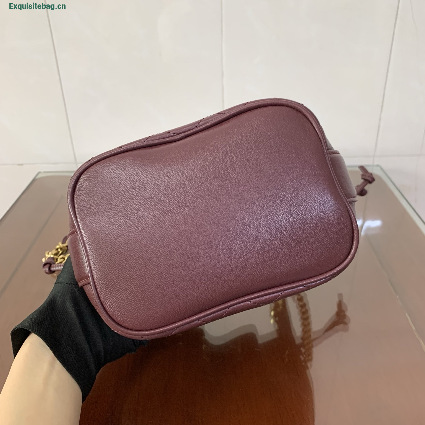 Saint Laurent Cassandra Mini leather bucket bag Burgundy