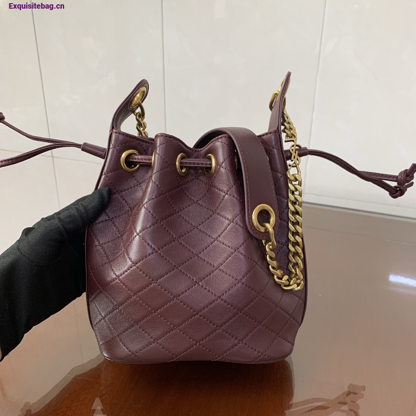 Saint Laurent Cassandra Mini leather bucket bag Burgundy