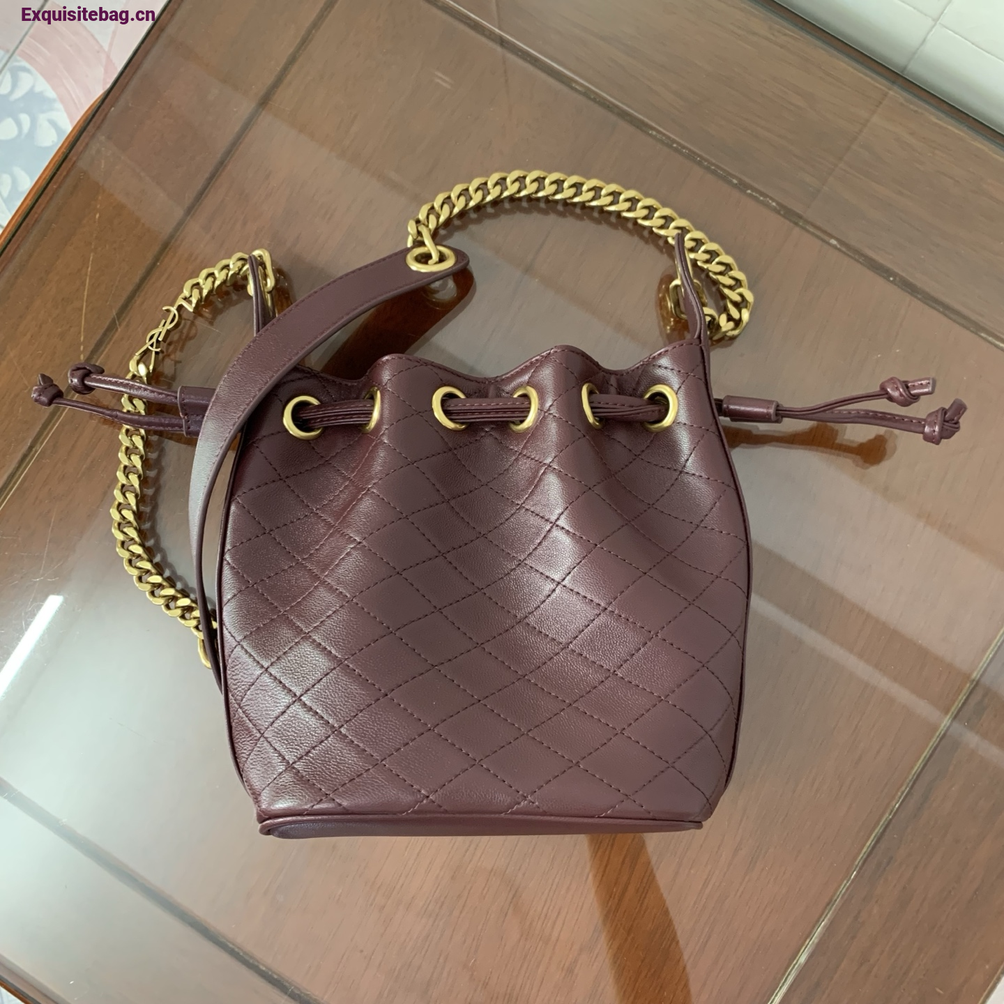 Saint Laurent Cassandra Mini leather bucket bag Burgundy