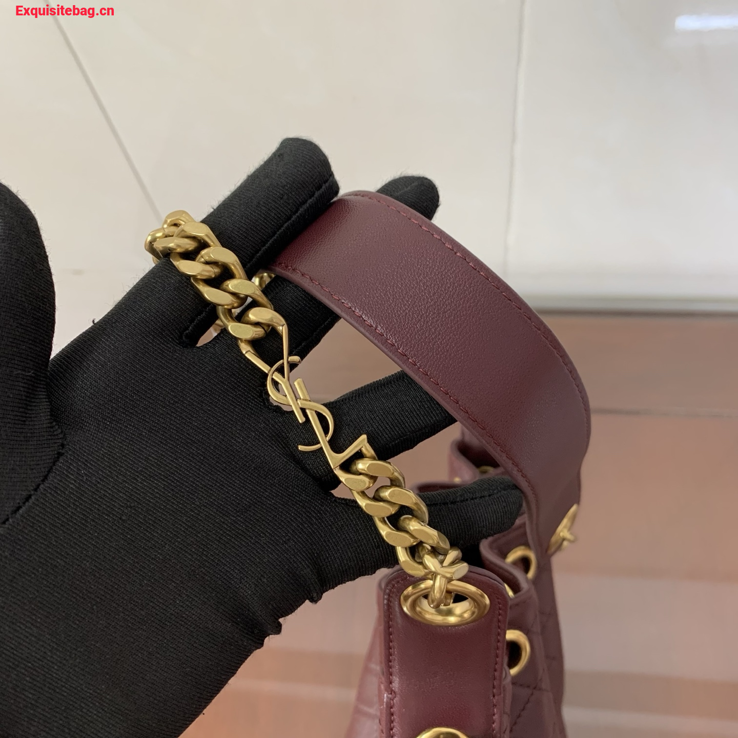Saint Laurent Cassandra Mini leather bucket bag Burgundy
