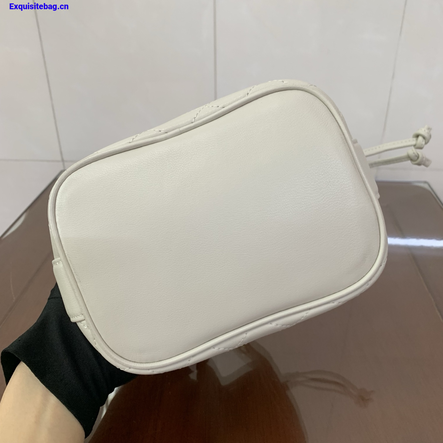 Saint Laurent Cassandra Mini leather bucket bag White