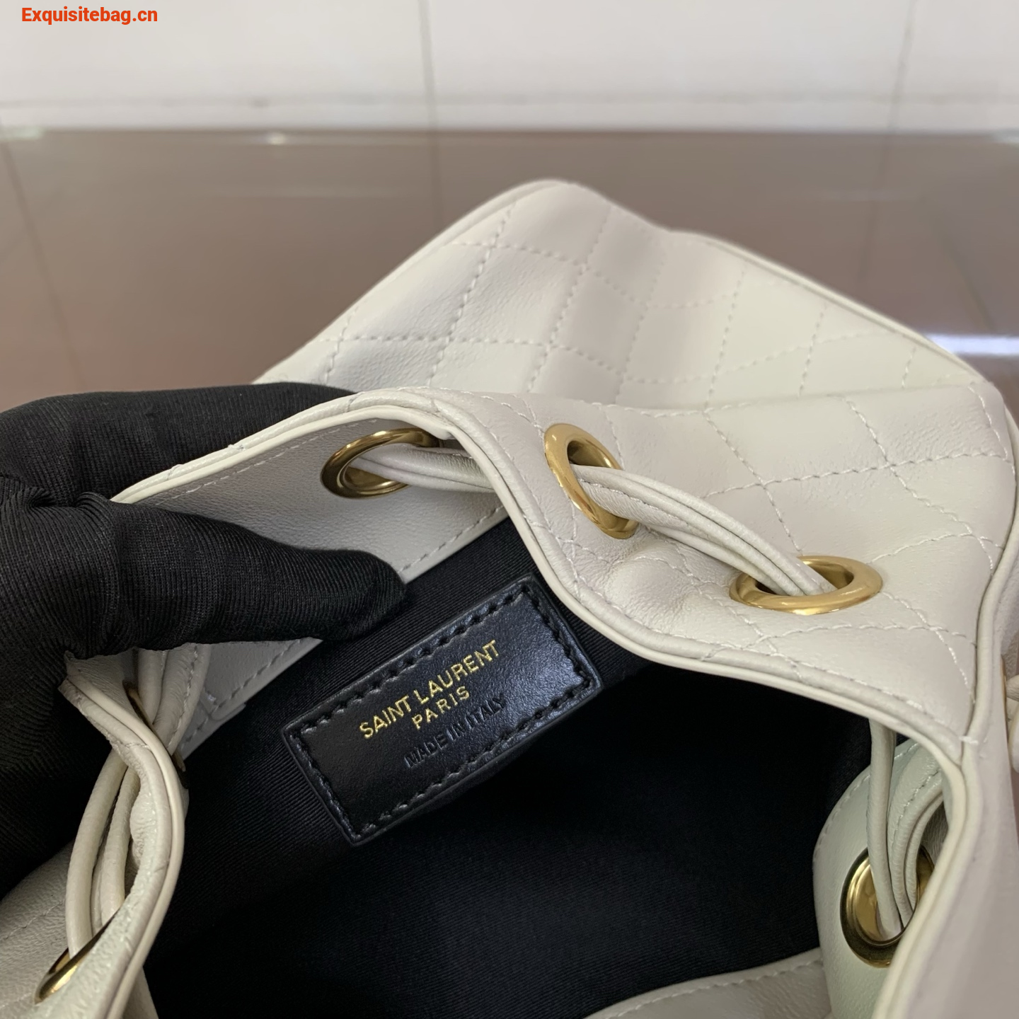 Saint Laurent Cassandra Mini leather bucket bag White