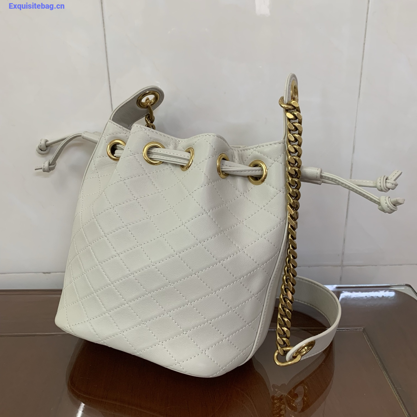 Saint Laurent Cassandra Mini leather bucket bag White
