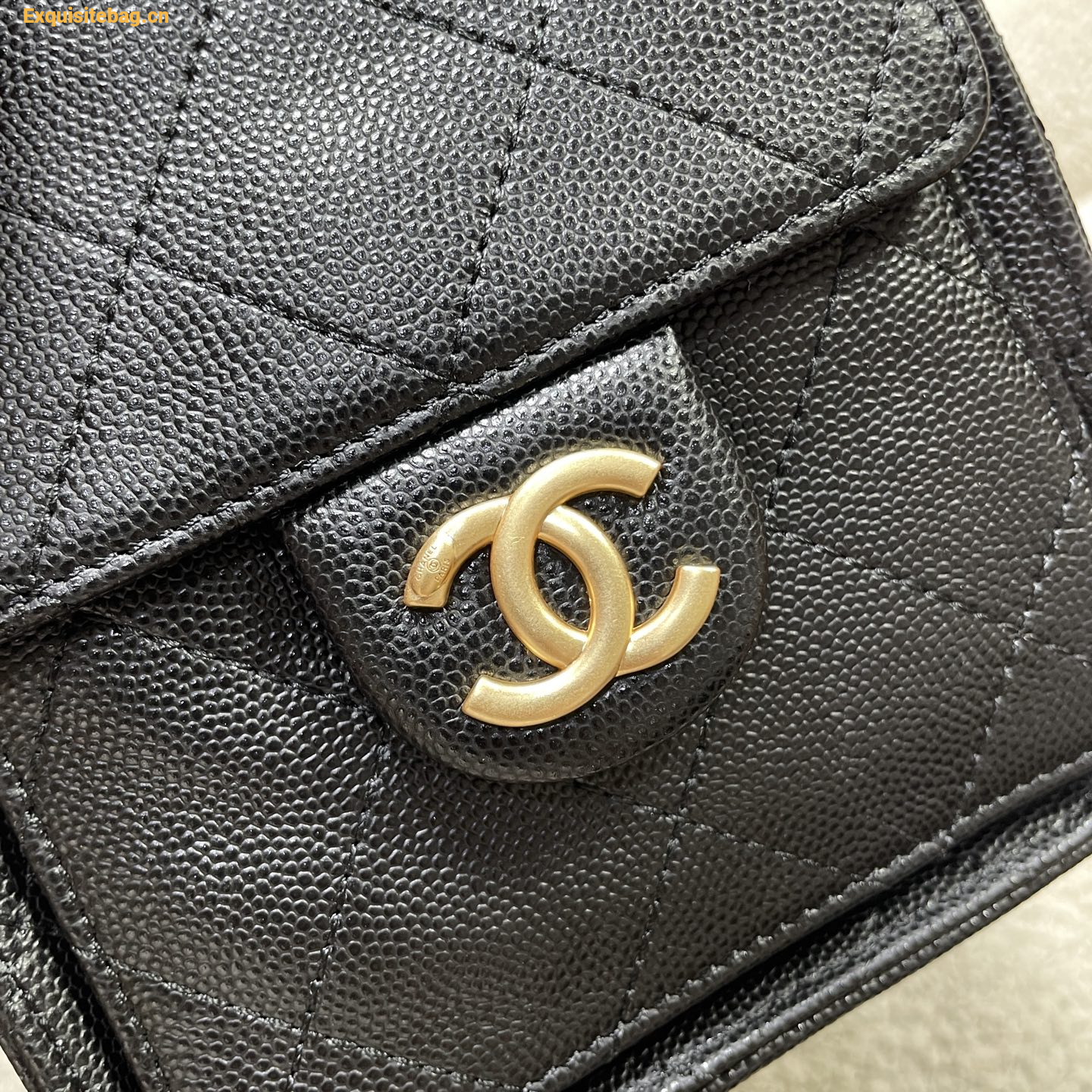 Chanel 25 Black diamond patterned drawstring handbag