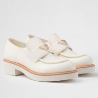Prada Womens Loafers in White Grained Leather